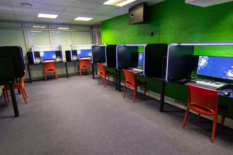 The green production lab at PASMA, rows of DAW workstations